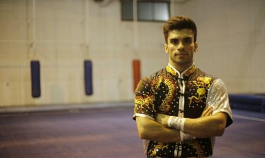 قهرمان ووشوی خوزستان، سرمربی تیم ملی تالو