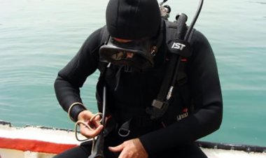 کمک مربی غواص در کیش سارق از آب درآمد!