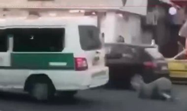 ببینید| پرت شدن یک زن از ماشین پلیس!