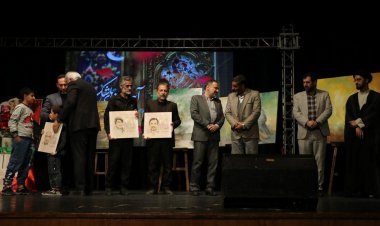 تکریم خانواده شهدای حرم شاهچراغ (ع)